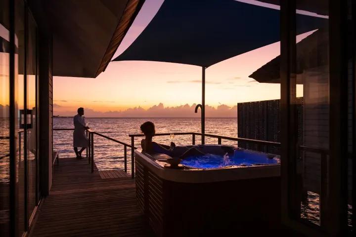 Sunset Over Water Villa with Hot Tub