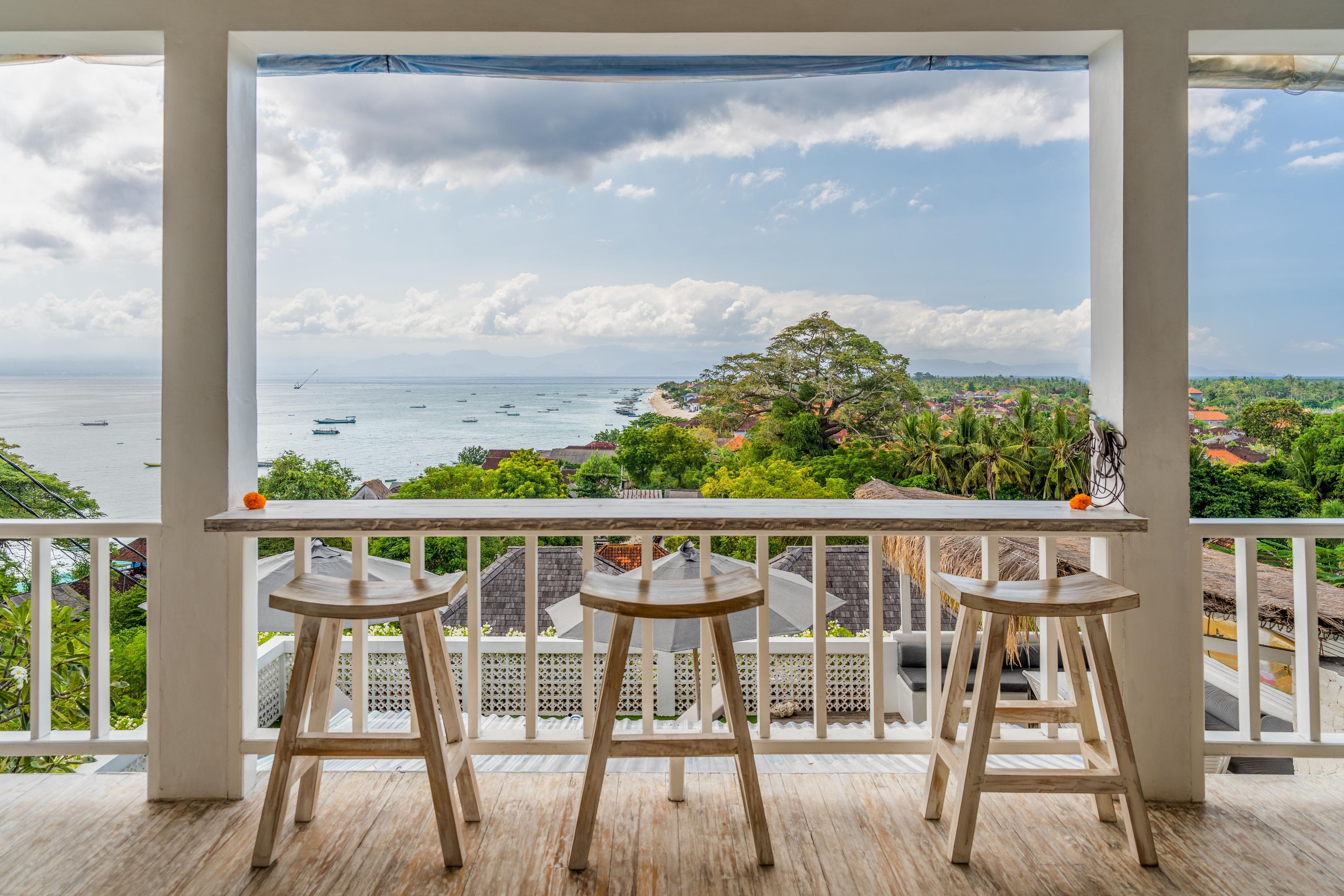 Dining room view from private villa in Nusa Lembongan Island overlooking Mount Agung on Bali