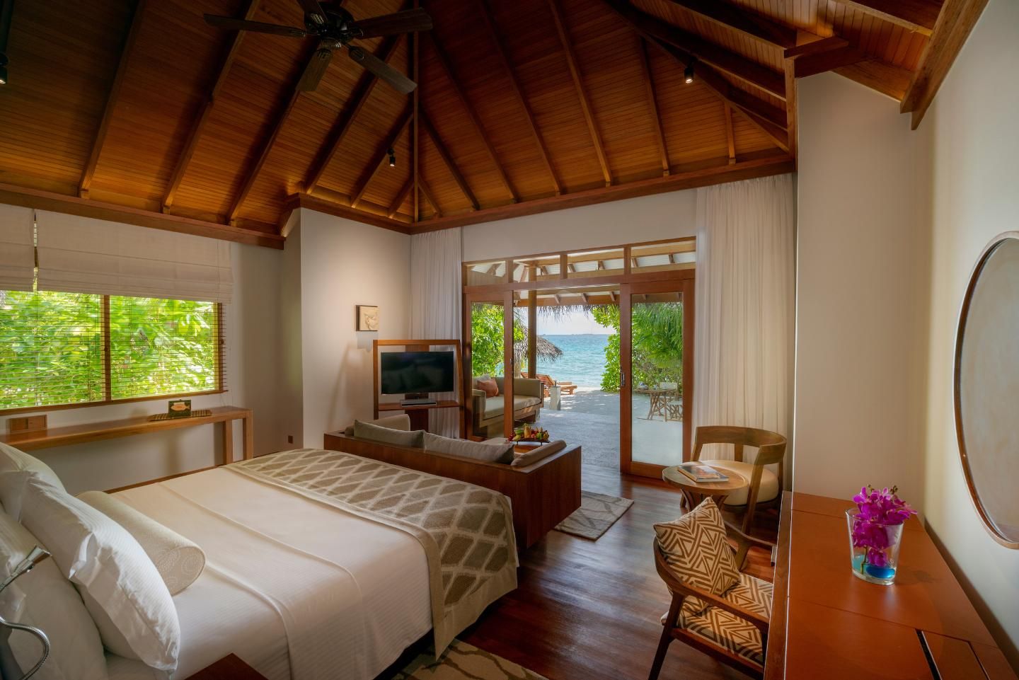 Baros Maldives - Rooms - Deluxe Beach Villa - Bedroom - Interior.jpg