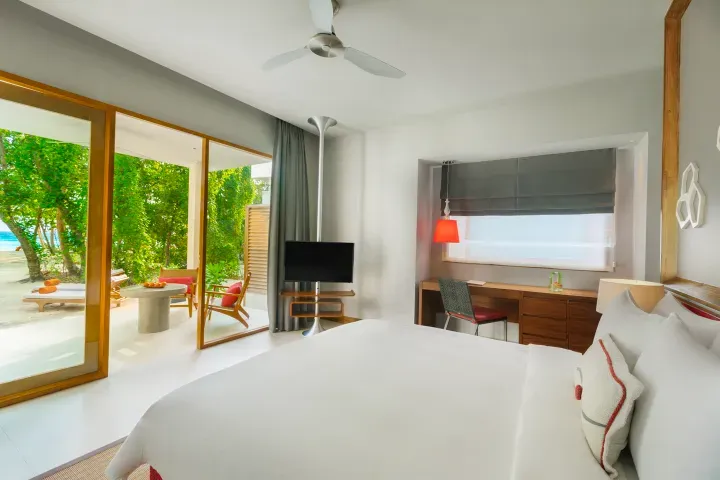 Dhigali-Maldives-Rooms-Beach-Bungalow-Bedroom-sm.webp