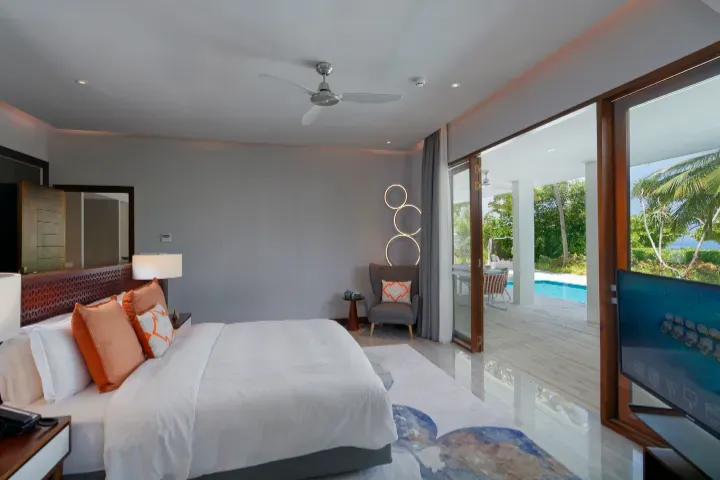 Dhigali-Maldives-Rooms-Dhigali-Suite-Bedroom-With-Beach-View-sm.webp