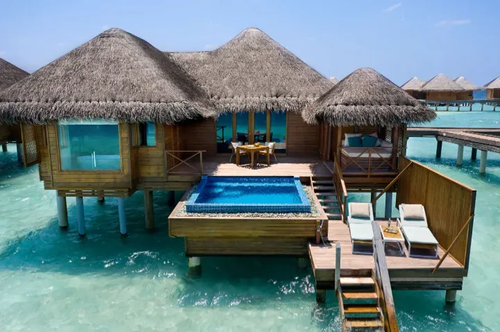 Huvafen-Fushi-Maldives-Rooms-Lagoon-Bungalow-with-Pool-Exterior-sm.webp