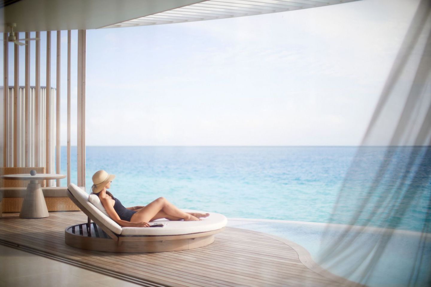 The-Ritz-Carlton-Maldives-Fari-Islands-Rooms-Lagoon-Pool-Villa-Outdoor-Deck-Sunbed.jpg