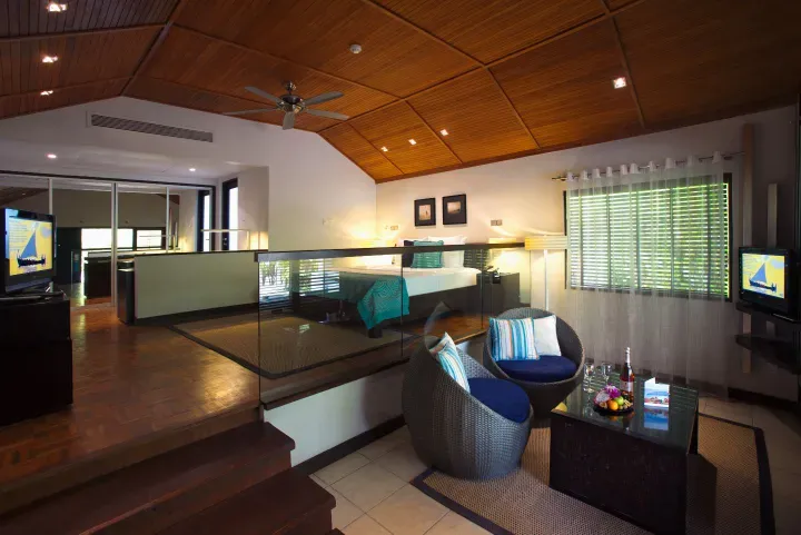 Velassaru-Maldives-Rooms-Deluxe-Bungalow-Living-Area-sm.webp