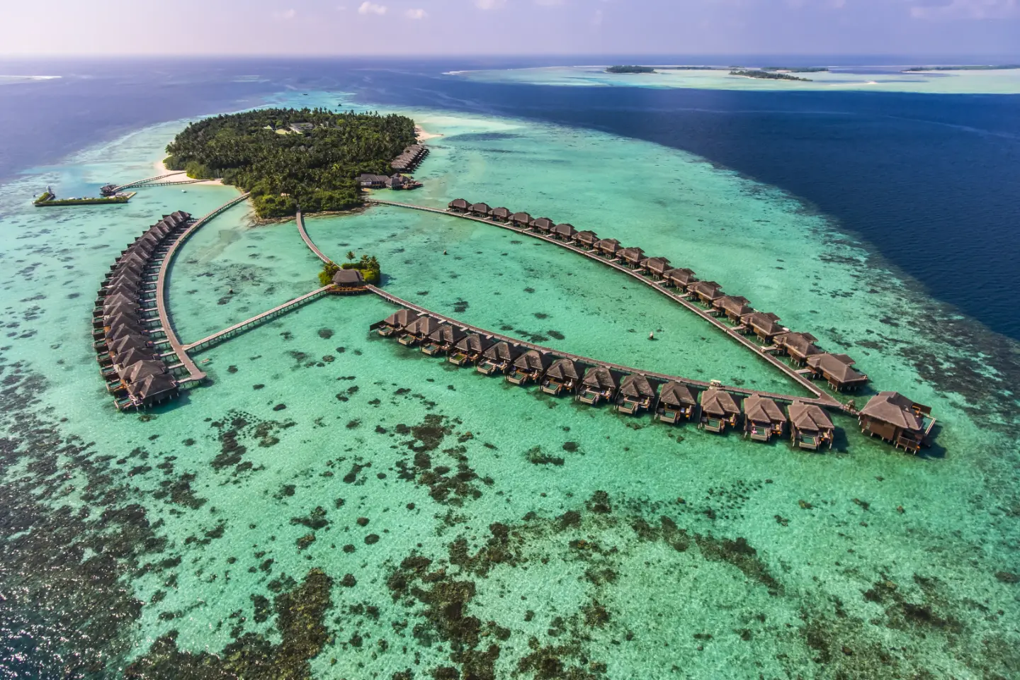 Ayada-Maldives-Resort-Aerial-Island-and-Water-Villas-3.webp